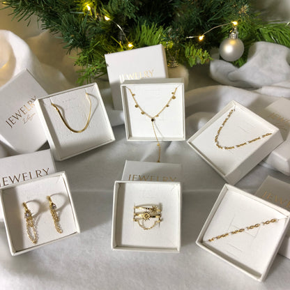 Coffret doré : 2 bijoux parmi 6